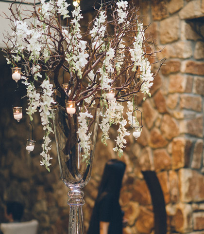 branch stick centerpiece flowers candles